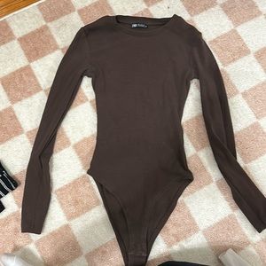 Browns are long sleeve body con bodysuit